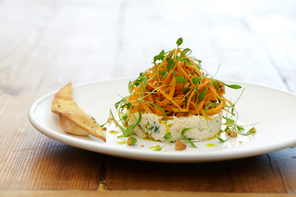 Crab, carrot and coriander salad with toasted hazelnuts and sea salt flat bread